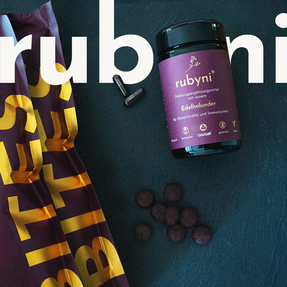 rubyni® Edelholunder im Glas mit dunkelrotem Etikett, Hinweis auf ElderCraft-Extrakt zur Unterstützung von Abwehrkräften und Immunsystem