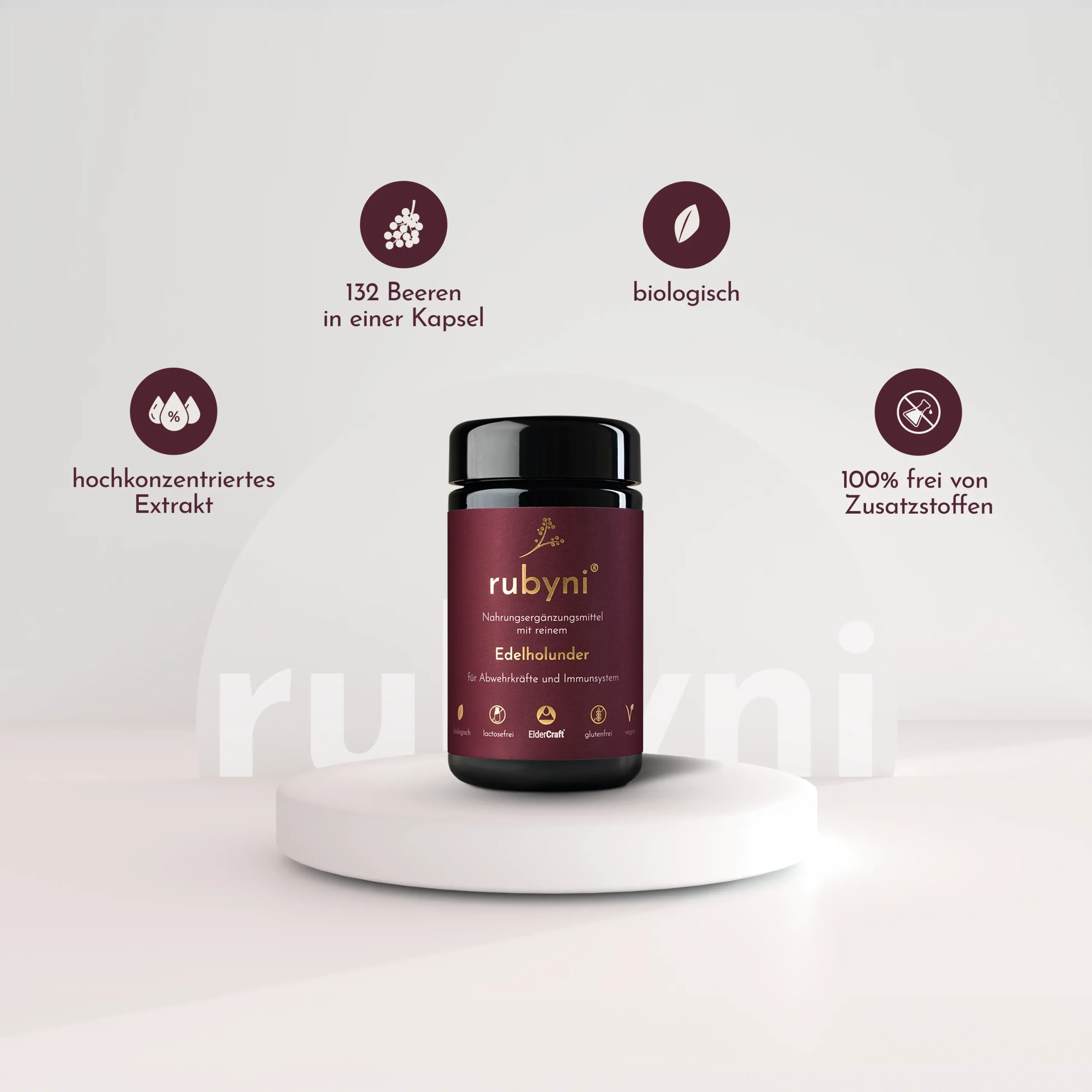 rubyni-Edelholunder-slide4 rubyni® Edelholunder im Glas auf einem kleinen weißen Sockel, eingerahmt von den Health Claims.